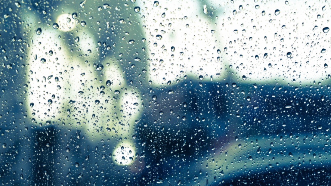 Raindrops on a window pane.