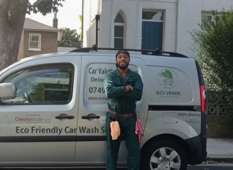 John Muriel, founder of Ecoverde Valeting, beside his branded eco van in West London