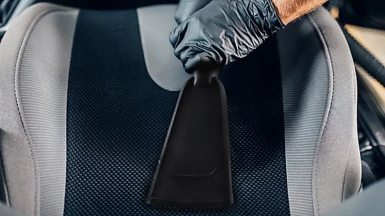 Cleaning a car seat with tool