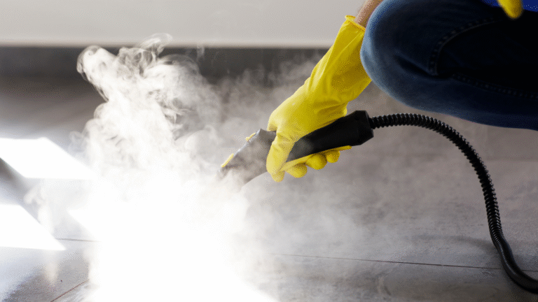 Person cleaning floor with steam